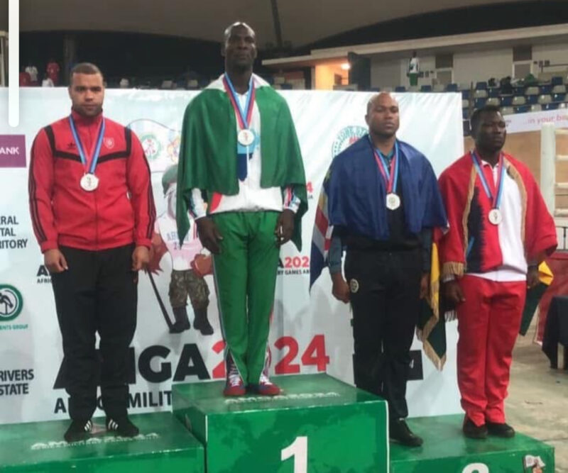 A top Nigerian official claims the boxing tournament is being run under military rules but the opposing officials_ _dismiss their defence describing it as an attempt to win eight gold medals through the back door